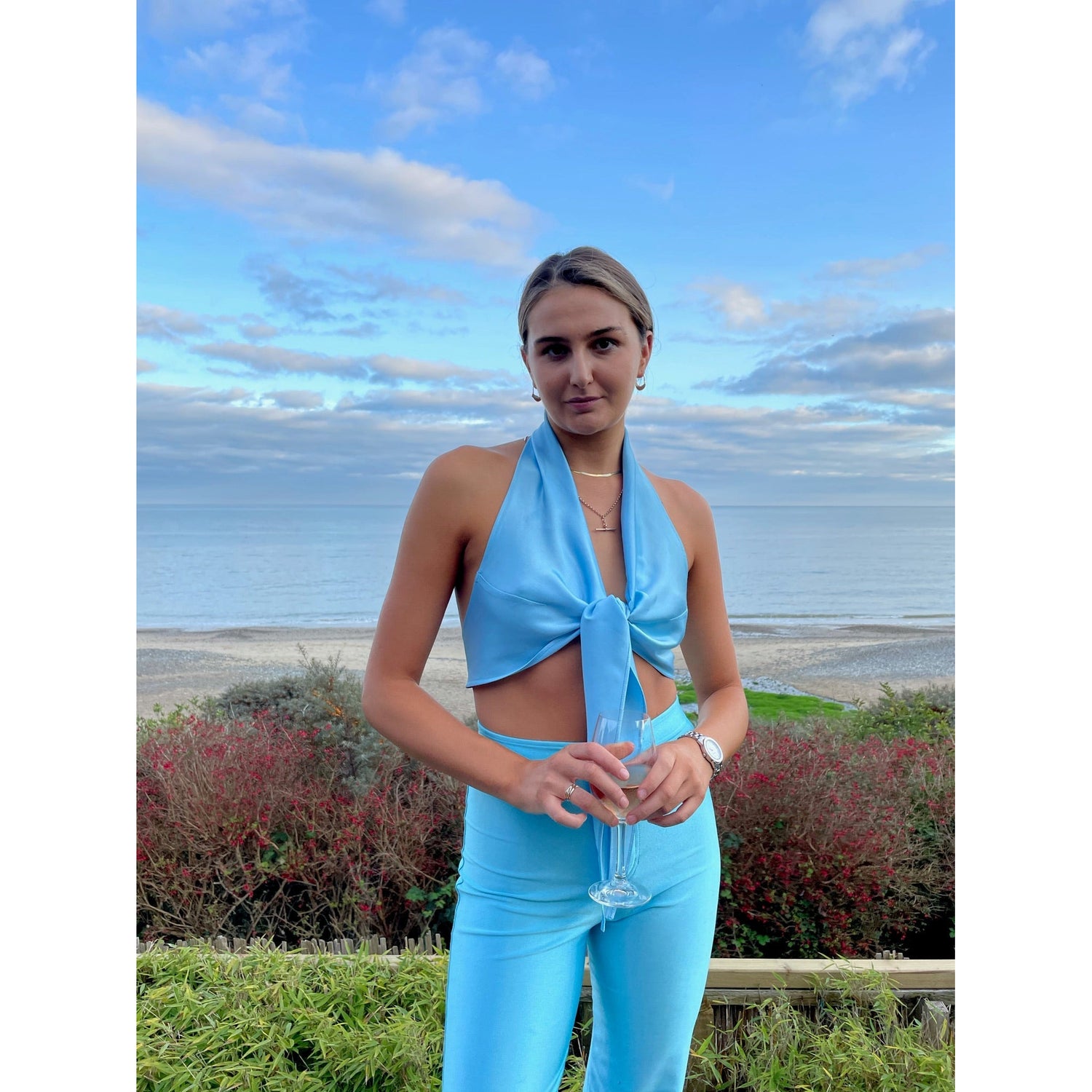 rezek studio donna halter aqua top to rent